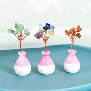 Three handmade crystal trees with copper wire branches in small ceramic pots for home decor