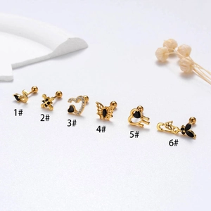 Set of gold stainless steel stud earrings with black zircon hearts and butterflies