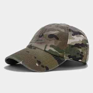 Detail shot of tactical jungle camouflage baseball cap with durable cotton twill texture