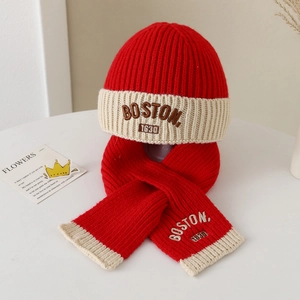 Detail of red and cream knit hat and scarf set with BOSTON 1630 embroidery for kids
