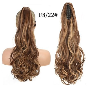 Detail of long wavy claw clip ponytail extension in F8/22 brown and blonde mix