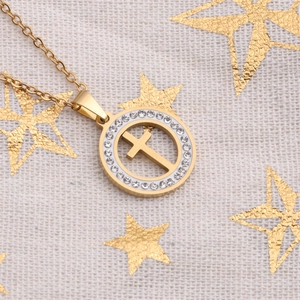 Gold stainless steel cross necklace with crystal circle pendant on star fabric