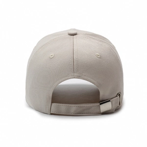 Beige baseball cap back view showing 3D cross embroidery and metal strap adjustment buckle