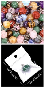 Macro detail of pumpkin crystal pendants in various natural stones and packaged size display