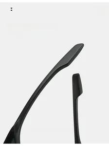 Detail of ergonomic curved mirror legs on matte black cat eye sunglasses for comfort