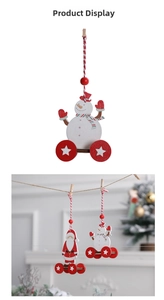 Detail of wooden snowman and Santa hanging ornaments with red pulleys and twine