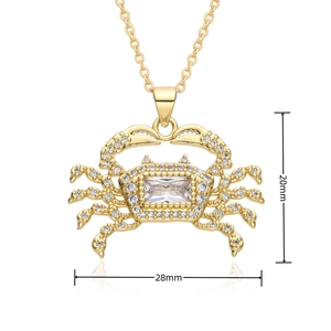 Detailed view of crab pendant with dimensions 20mm by 28mm and white cubic zirconia