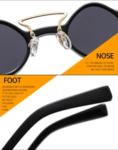 Ergonomic detail of black punk sunglasses with gold bridge and soft silicone nose pads