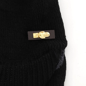 Black knit winter hat with premium brown leather patch and vintage gold buckle detail
