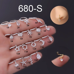 Collection of various small silver hoop rings with diverse crystal charms for body piercing