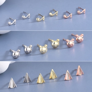 S925 sterling silver studs in music note, bear, and plane shapes in gold and silver