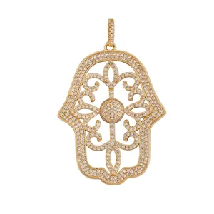 Detailed view of gold Hamsa hand charm with dimensions and cubic zirconia inlay