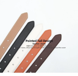 Detail view of colorful leather belts with stitched edges and sharp tail design