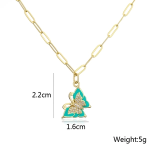 Detail view of 18K gold plated butterfly necklace with 2.2cm x 1.6cm size dimensions