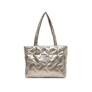 Champagne gold quilted tote bag with padded double straps and fashion logo tag