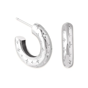 Detailed view of silver C-shaped hoop earrings with engraved stars and sparkling zircons