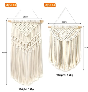 Detail of bohemian macrame wall hanging with geometric hand-woven cotton patterns and tassels