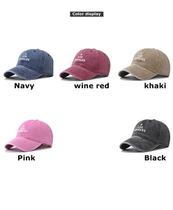 Detailed color display of washed vintage baseball caps in navy, wine, khaki, pink, and black