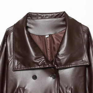 Women's brown double-breasted faux leather trench coat with lapel and stitch details
