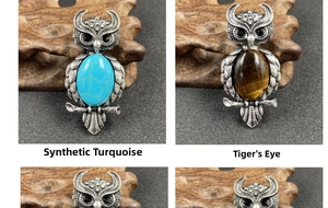 Detail showing vintage owl pendant set with synthetic turquoise and tiger eye gemstones