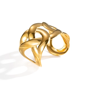 Detailed view of polished 18K gold-plated hollow twisted bangle with interweaving pattern
