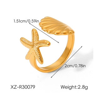 Detail showing 1.51cm starfish shell ring size and 2.8g weight on white background