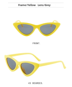 Detail view of yellow cat eye sunglasses with grey lenses from front and side angles