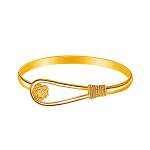 Detailed shot of golden rose relief and metallic wire decorative detail on the flower bangle