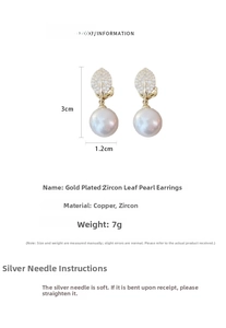 Detail view of leaf-shaped pearl earrings with gold plating and cubic zirconia accents
