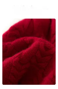 Detailed macro view of red cashmere knit fabric with classic cable stitch texture