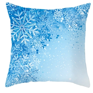 Close-up of blue square pillowcase featuring detailed snowflake and dot pattern design