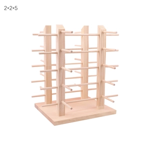 Detailed macro view of wooden eyewear display stand with natural grain and pillar structure