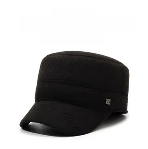 Detail view of coffee winter ear flap cap with warm fleece lining and metal plate