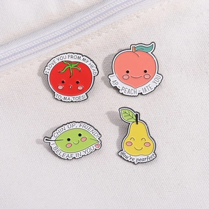 Set of 4 cute fruit enamel pins with puns on white canvas bag for bags and clothing