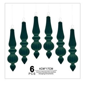Detail of 6 deep green flocked cone-shaped Christmas ornaments with silver rings