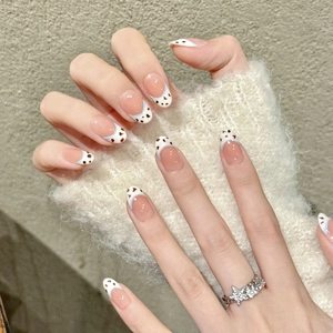 Handmade press-on nails with nude pink base, French leopard patterns and blue accent lines