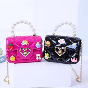 Mini pearl handle jelly crossbody bags for kids with colorful cartoon charms and gold chain