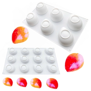 Detailed view of 6 and 12-cavity silicone banana molds with colorful mousse cake samples