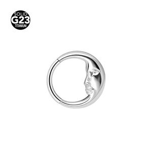 Detailed view of G23 titanium seamless nose ring featuring a moon face relief design