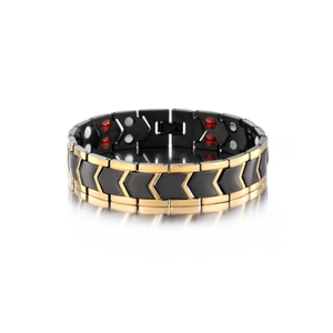 Macro shot of men's magnetic therapy bracelet with black and gold arrow-shaped links