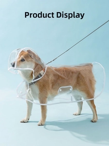 Close-up of transparent waterproof pet raincoat with white trim and snap buttons