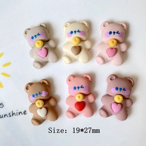Detailed view of colorful 19x27mm DIY resin bear charms for phone cases and crafts