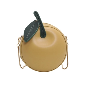 Cute apple shaped mini crossbody bag in yellow leather with gold chain and green leaf