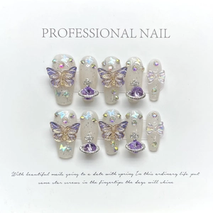 Luxurious purple glitter press-on nails with 3D butterfly and planet charms