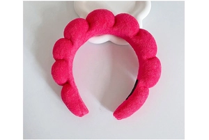 Detail of rose red cloud headband with soft velvet texture and unique bubble design