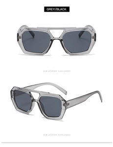 Detailed front and 45-degree side views of grey geometric double-bridge sunglasses