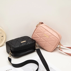 Minimalist crossbody camera bags in black and pink with elegant quilted texture and gold hardware