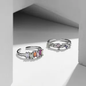 Adjustable silver rainbow ring with colorful zircon stones and irregular molten texture