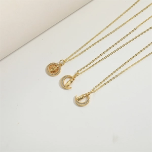 Luxury gold crescent moon and sun star medal necklaces with inlaid cubic zirconia