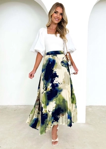 Detail view of high-waist pleated midi skirt with abstract oil painting floral print